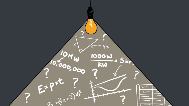 A light bulb illuminates a chalkboard full of math equations